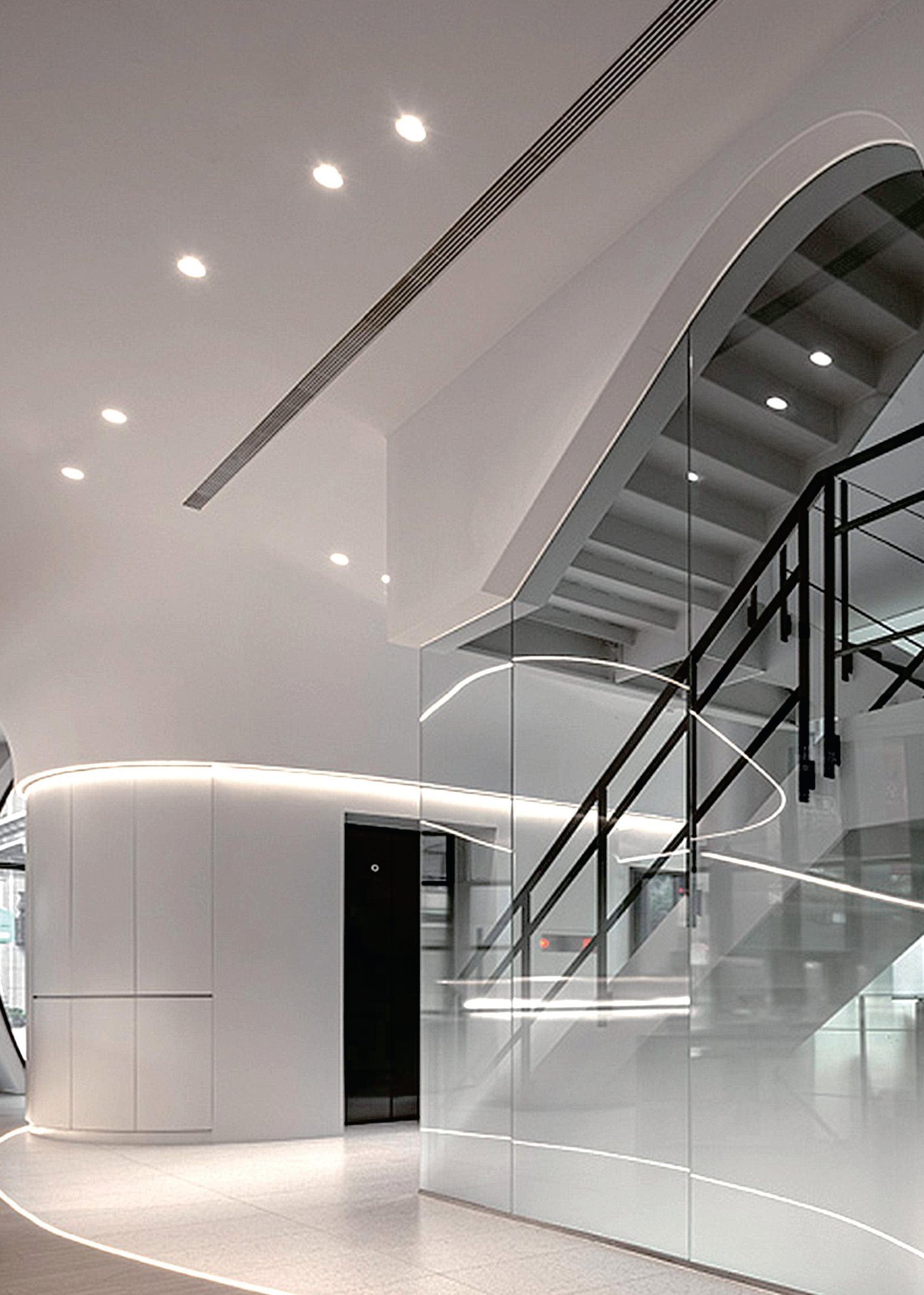 Linear and recessed lighting in a public atrium